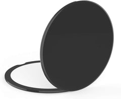 Compact cosmetic mirror with magnification