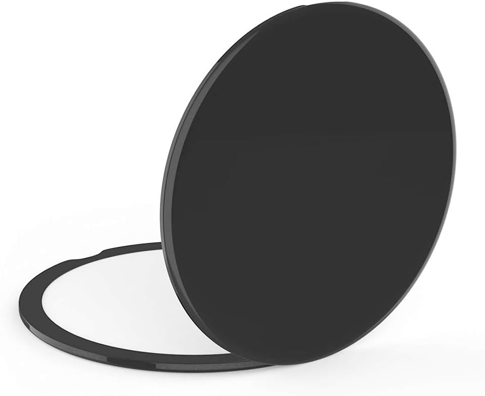 Compact cosmetic mirror with magnification