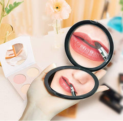 Compact cosmetic mirror with magnification